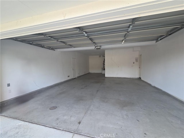1480 Bedford Ct, Beaumont, CA 92223 - garage featuring a garage door opener