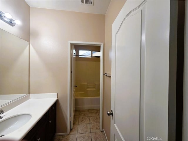 1480 Bedford Ct, Beaumont, CA 92223 - full bath with vanity, tile patterned floors, a bathtub, baseboards, and a shower