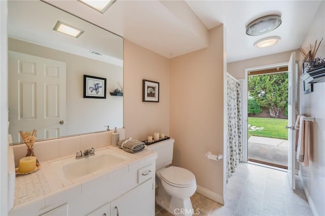 637 Anson St, Simi Valley, CA 93065 - bathroom with toilet, vanity, curtained shower, baseboards, and tile patterned floors
