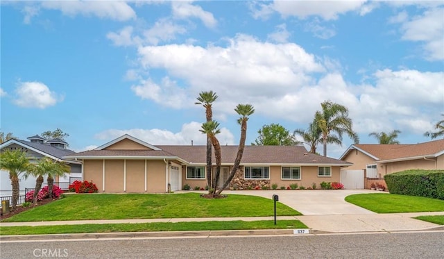 637 Anson St, Simi Valley, CA 93065 - ranch-style home featuring concrete driveway, stucco siding, and an attached garage