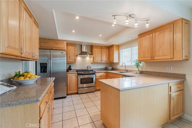 637 Anson St, Simi Valley, CA 93065 - kitchen featuring stainless steel appliances, wall chimney exhaust hood, light brown cabinetry, a sink, and recessed lighting