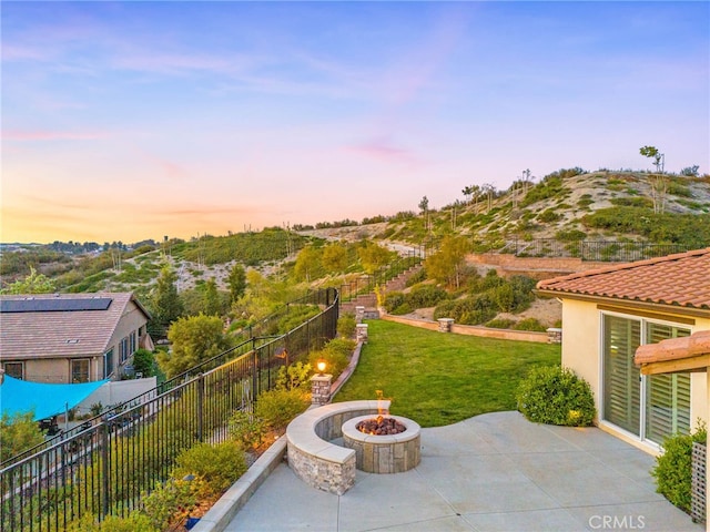 view of patio / terrace with a fire pit