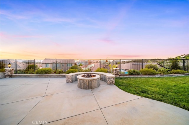 view of patio with a fire pit