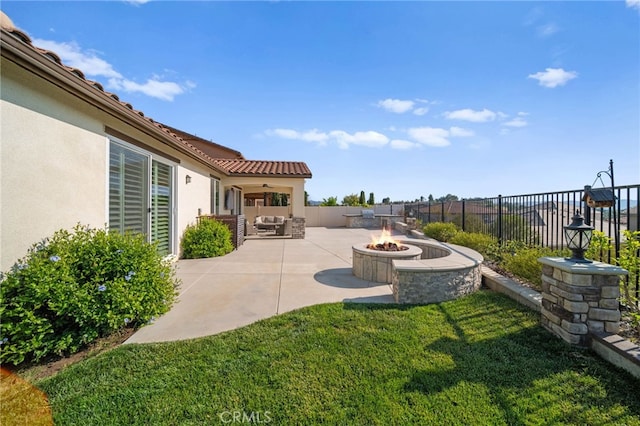 40571 Alder Ct, Temecula, CA 92591 - view of yard featuring a patio area, an outdoor living space with a fire pit, and ceiling fan