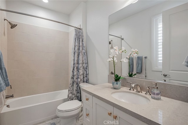 full bathroom with shower / bathtub combination with curtain, toilet, and vanity