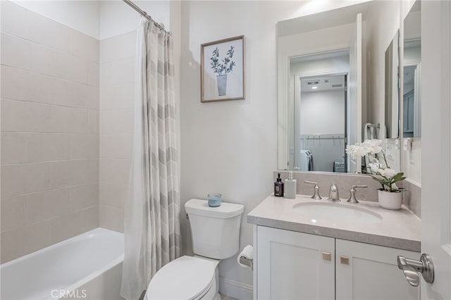 full bath featuring toilet, vanity, and shower / bathtub combination with curtain