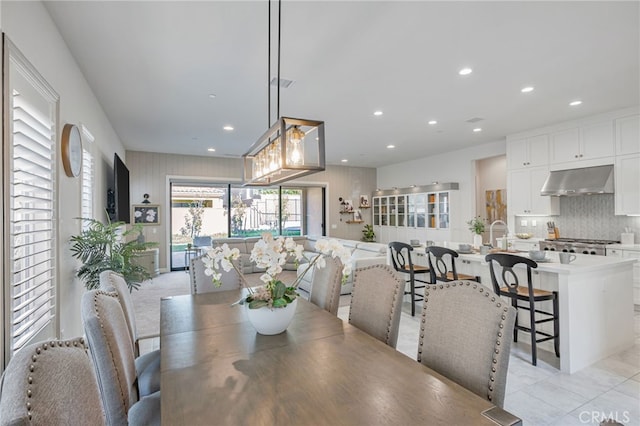 dining room with light tile patterned floors, visible vents, and recessed lighting