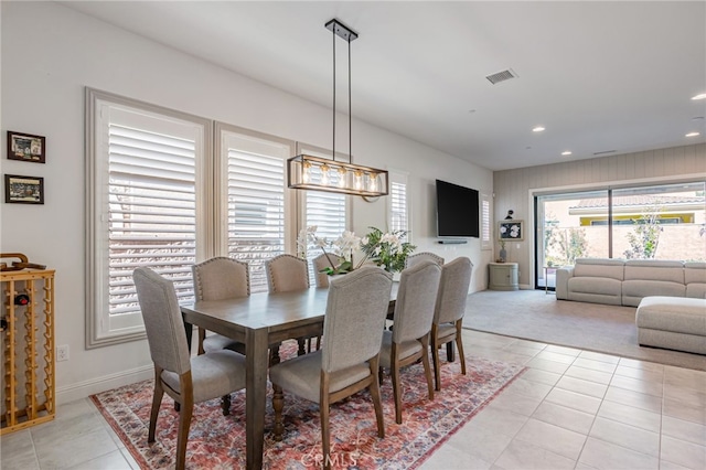 dining space with light tile patterned floors, visible vents, baseboards, and recessed lighting