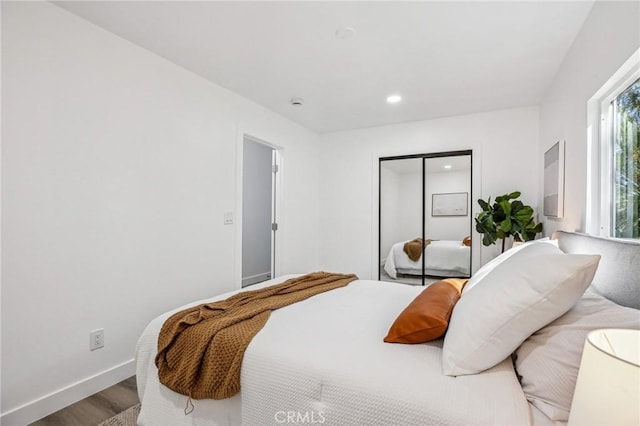 811 W Oliver St, San Pedro, CA 90731 - bedroom with wood finished floors, baseboards, recessed lighting, and a closet