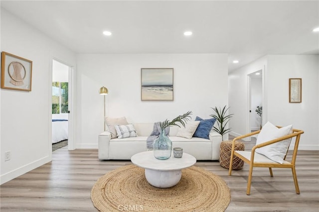811 W Oliver St, San Pedro, CA 90731 - living room with recessed lighting, baseboards, and light wood-style flooring