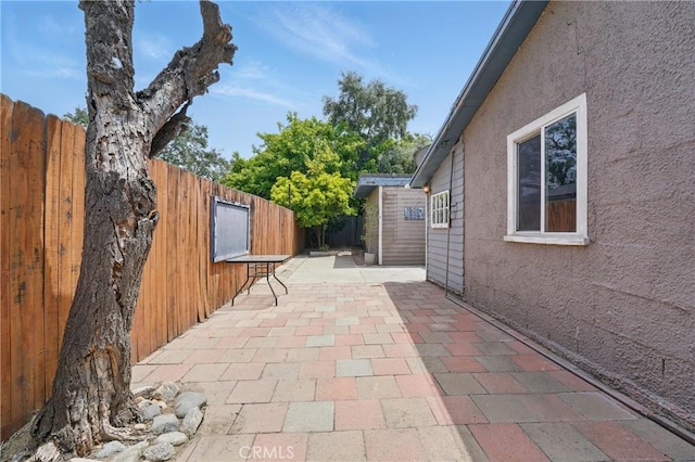 view of patio with a fenced backyard