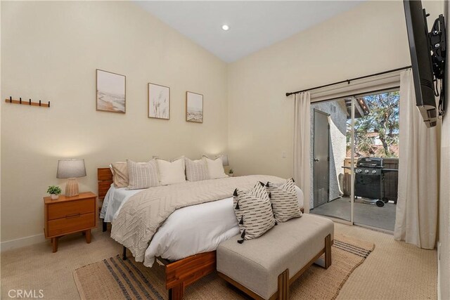 44 Corniche Dr Unit G, Dana Point, CA 92629 - bedroom with access to exterior, light colored carpet, recessed lighting, and baseboards