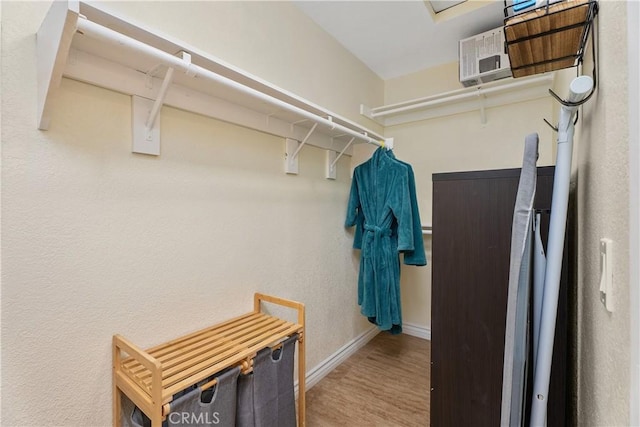 44 Corniche Dr Unit G, Dana Point, CA 92629 - walk in closet featuring wood finished floors