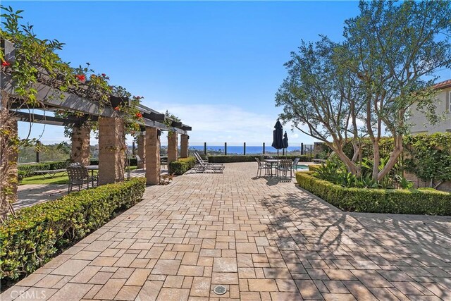 44 Corniche Dr Unit G, Dana Point, CA 92629 - view of community featuring a patio area, a gazebo, and a swimming pool