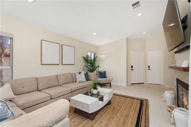 44 Corniche Dr Unit G, Dana Point, CA 92629 - carpeted living area with a glass covered fireplace, baseboards, and recessed lighting