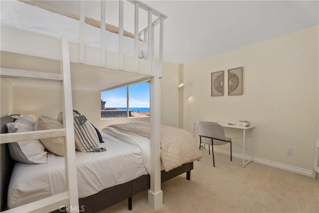 44 Corniche Dr Unit G, Dana Point, CA 92629 - carpeted bedroom featuring a water view and baseboards