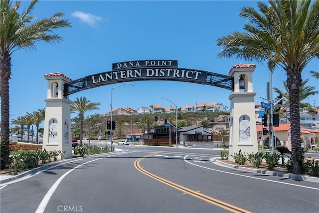 44 Corniche Dr Unit G, Dana Point, CA 92629 - view of asphalt street with street lights, curbs, and traffic lights
