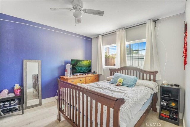 2111 Sanford St, Oxnard, CA 93033 - bedroom featuring baseboards, ceiling fan, and wood finished floors
