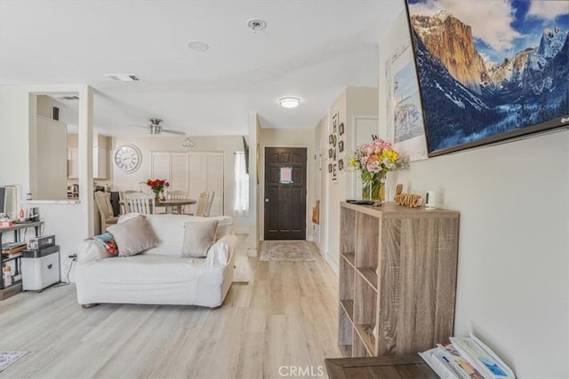 2111 Sanford St, Oxnard, CA 93033 - living room featuring light wood-style flooring and visible vents