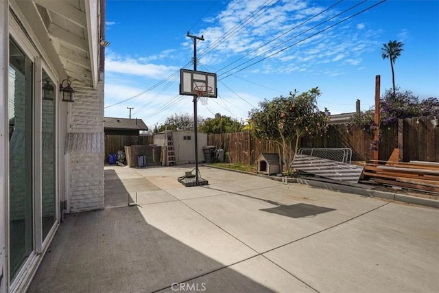 2111 Sanford St, Oxnard, CA 93033 - view of patio featuring an outbuilding, a shed, and a fenced backyard