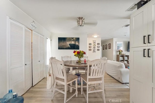 2111 Sanford St, Oxnard, CA 93033 - dining area with light wood finished floors and visible vents