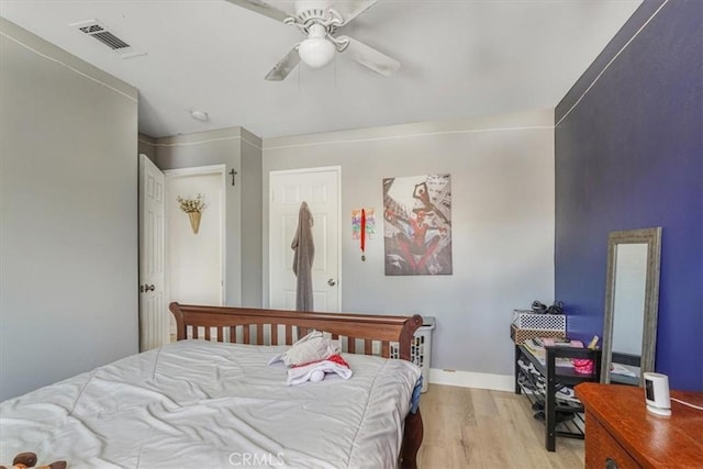 2111 Sanford St, Oxnard, CA 93033 - bedroom featuring baseboards, a ceiling fan, visible vents, and wood finished floors