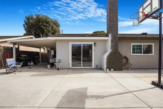 2111 Sanford St, Oxnard, CA 93033 - rear view of property with fence and stucco siding