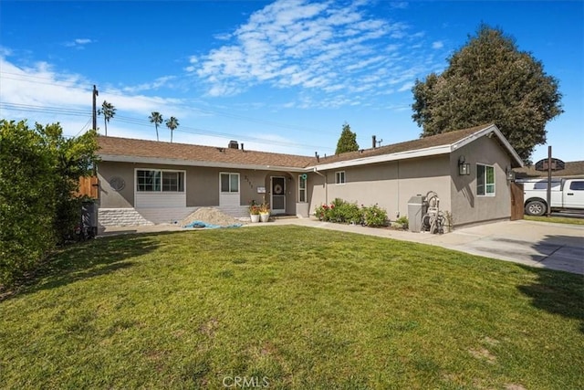 2111 Sanford St, Oxnard, CA 93033 - back of property with stucco siding and a lawn