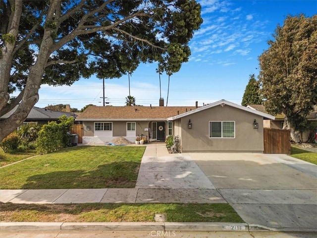 2111 Sanford St, Oxnard, CA 93033 - ranch-style home featuring concrete driveway, stucco siding, fence, and a front yard