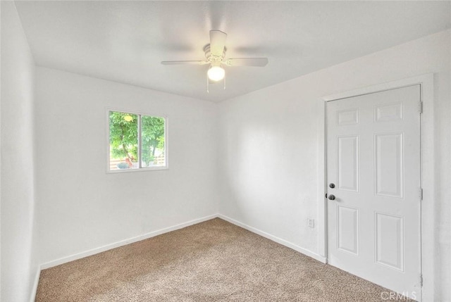 419 San Jacinto St, Redlands, CA 92373 - carpeted spare room with baseboards and a ceiling fan