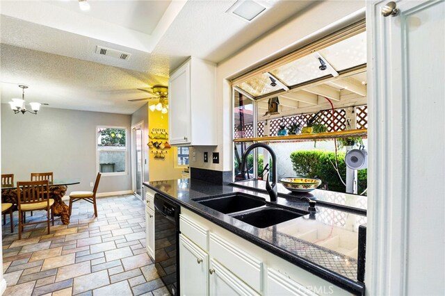 9387 Hot Springs Rd, Corona, CA 92883 - kitchen with a sink, stone tile flooring, visible vents, dishwasher, and white cabinetry