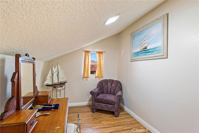 9387 Hot Springs Rd, Corona, CA 92883 - office area featuring lofted ceiling, a textured ceiling, baseboards, and wood finished floors