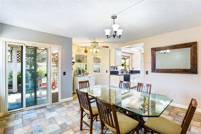9387 Hot Springs Rd, Corona, CA 92883 - dining room featuring a wealth of natural light, stone tile floors, and a textured ceiling