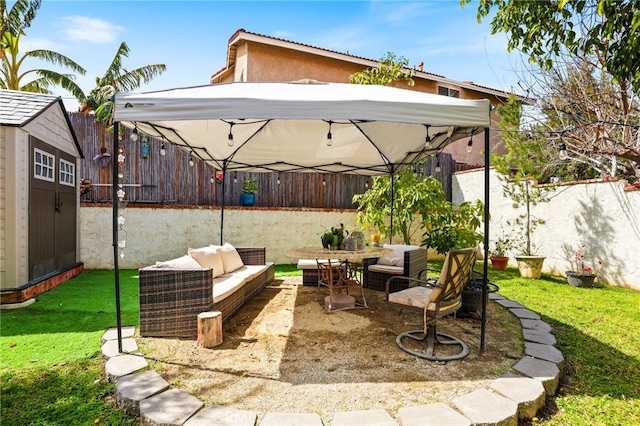 9387 Hot Springs Rd, Corona, CA 92883 - view of patio with a fenced backyard, an outdoor structure, an outdoor hangout area, a gazebo, and a storage shed