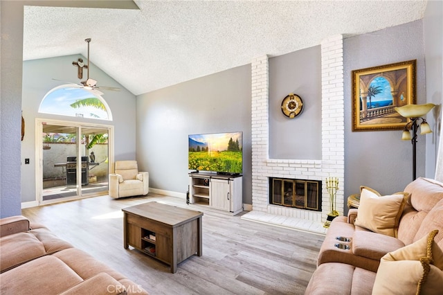9387 Hot Springs Rd, Corona, CA 92883 - living room featuring vaulted ceiling, ceiling fan, a textured ceiling, and wood finished floors