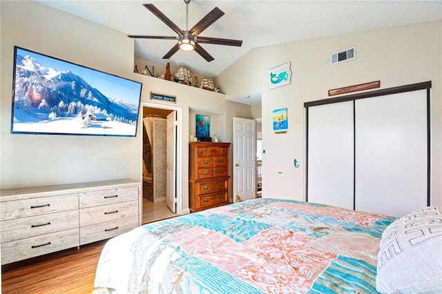 9387 Hot Springs Rd, Corona, CA 92883 - bedroom featuring wood finished floors, a closet, visible vents, ceiling fan, and vaulted ceiling