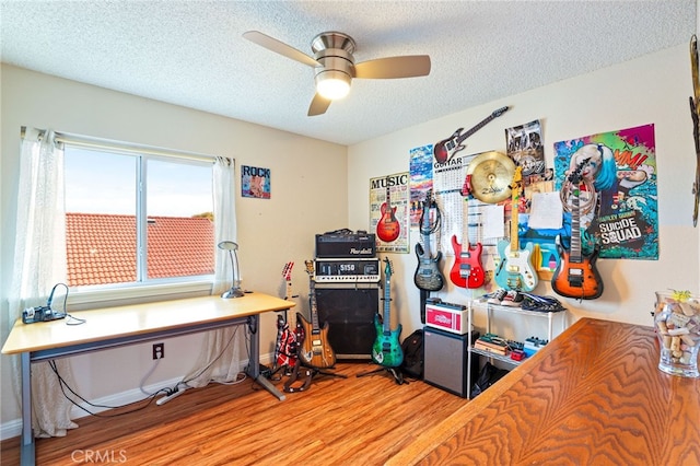 9387 Hot Springs Rd, Corona, CA 92883 - interior space with a ceiling fan, baseboards, a textured ceiling, and wood finished floors