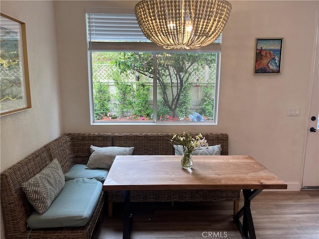 1129 W Capitol Dr Unit 29, San Pedro, CA 90732 - dining room featuring a chandelier and wood finished floors