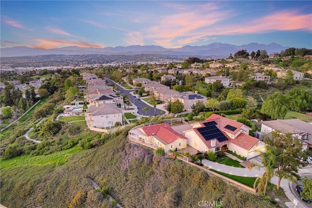 bird's eye view featuring a mountain view and a residential view