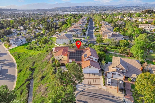 drone / aerial view featuring a mountain view and a residential view