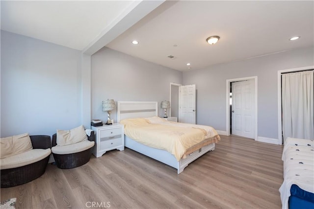2302 Delfs Ln, Rowland Heights, CA 91748 - bedroom with light wood-type flooring, recessed lighting, and baseboards