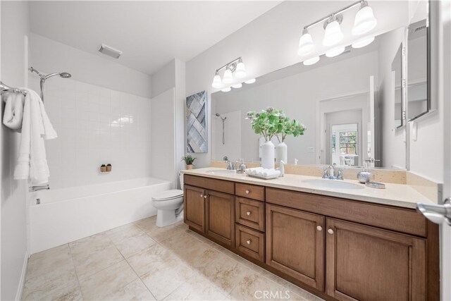 33 Jonquil, Irvine, CA 92618 - full bathroom featuring a sink, toilet, visible vents, shower / bath combination, and double vanity