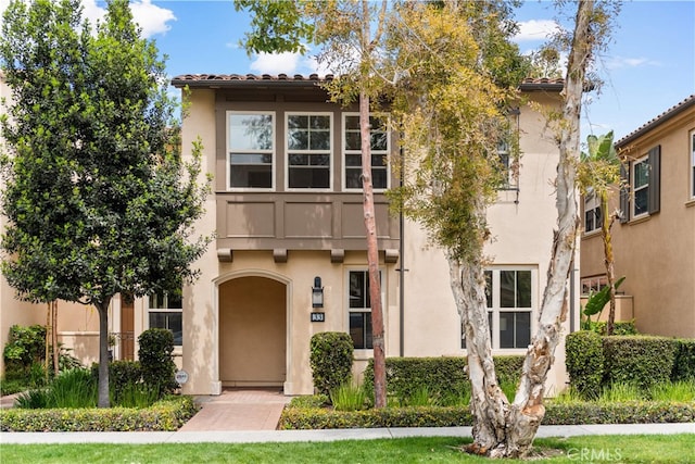 33 Jonquil, Irvine, CA 92618 - view of front facade featuring stucco siding and a tile roof