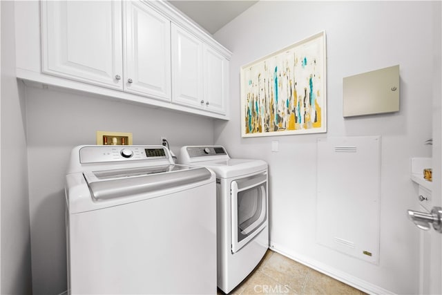 33 Jonquil, Irvine, CA 92618 - clothes washing area with separate washer and dryer, light tile patterned flooring, and cabinet space