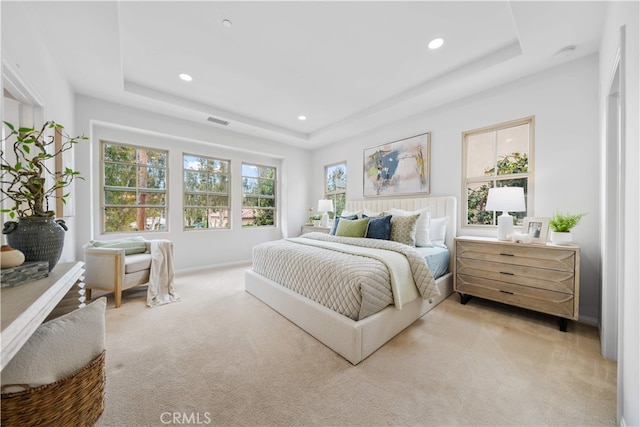 33 Jonquil, Irvine, CA 92618 - bedroom featuring light carpet, a raised ceiling, visible vents, and recessed lighting