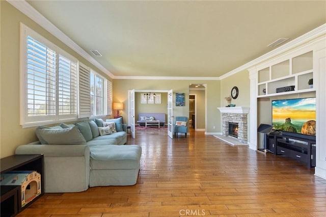 16673 Carob Ave, Chino Hills, CA 91709 - living area with hardwood / wood-style floors, crown molding, and a fireplace