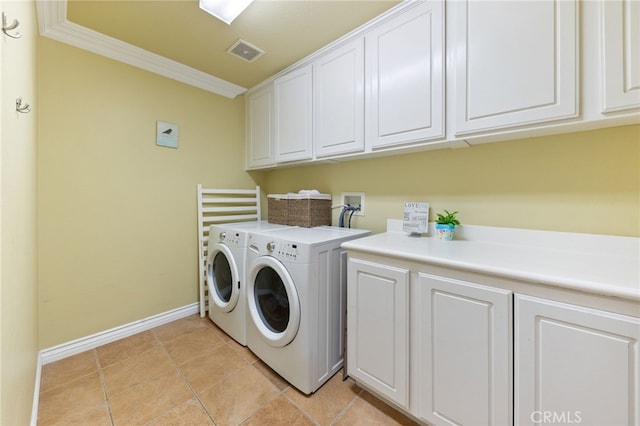 16673 Carob Ave, Chino Hills, CA 91709 - clothes washing area with cabinet space, washer and clothes dryer, ornamental molding, baseboards, and light tile patterned floors