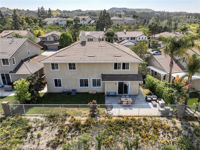 16673 Carob Ave, Chino Hills, CA 91709 - rear view of property with stucco siding, a residential view, a fenced backyard, a patio, and a mountain view