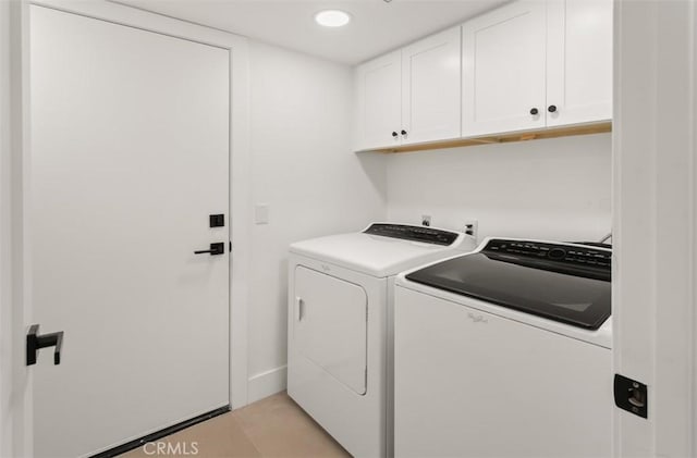 washroom with cabinet space, separate washer and dryer, baseboards, and recessed lighting
