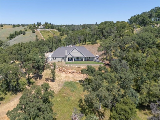 2483 Manhattan Bar Rd, Auburn, CA 95603 - aerial view of property and surrounding area featuring a heavily wooded area